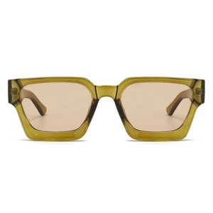 Close-up of translucent tea-colored square frames and light brown lenses on flat surface
