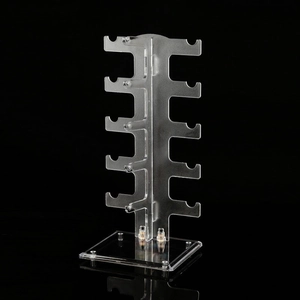 Five-tier clear acrylic eyewear display stand with double-row hooks on a black background