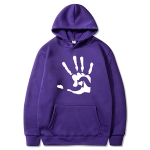 Close-up of purple fleece hoodie neckline showing size M tag and white handprint print