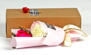 Pink soap flower bouquet with roses and carnations in a brown gift box for Mother's Day