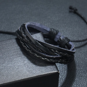 Men's multi-layer woven black leather bracelet featuring a vintage braided rope design