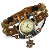 Detail view of retro punk leather watch band with skull rivets and multicolored beads