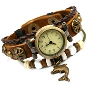Detail of vintage brown leather woven bracelet watch with a dolphin charm bead strap