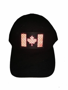 Detail of reflective Canada flag patch on a black tactical baseball cap