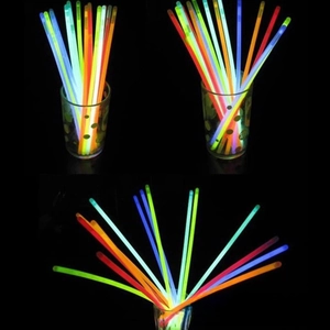 Glow sticks in vibrant green, yellow, blue, pink and orange for night parties and festivals