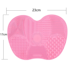 Pink silicone makeup brush cleaning mat featuring multiple textures and 23x17cm large size