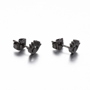 Detail view of black stainless steel eye-shaped stud earrings with geometric lashes