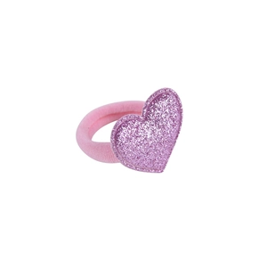 Detail of pink sequin heart hair tie with shimmering texture and high-elastic band
