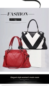 Close-up of soft leather tote bags in red and monochrome with V-shaped stitching detail