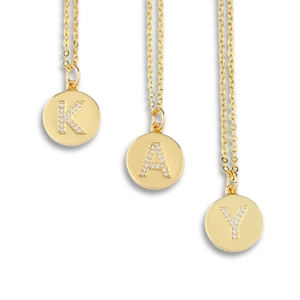 Gold round pendant necklace with zircon inlaid letters K, A, Y on minimalist chains