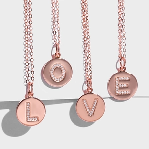 Minimalist rose gold necklace set with sparkling LOVE pave crystal letter pendants