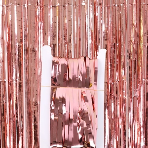 Rose gold foil fringe curtain for party backdrops, packaged neatly for event decoration