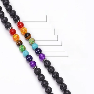 Chakra lava stone bracelet with tree of life charm and seven colored natural beads