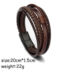 Detail view of multi-layer woven leather bracelet in dark brown with magnetic clasp