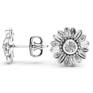 Detail of silver sunflower stud earrings with round center stone and butterfly back