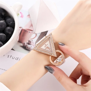Creative rose gold triangle rhinestone quartz watch with white leather band on wrist