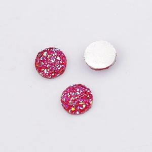 Macro detail of 10mm deep red resin druzy cabochons with sparkling iridescent texture