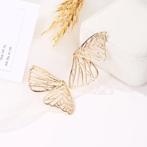 Exquisite gold hollow butterfly wing stud earrings for women with elegant filigree design