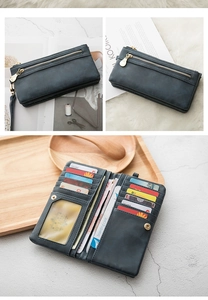 Detail view of vintage grey-blue long wallet with multi-slot interior and card organizer