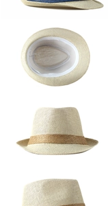 Detailed view of the woven paper straw fedora showing breathable texture and sweatband