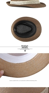 Detail view of brown straw fedora with cream band and mesh lining for sun protection