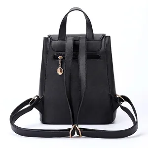 Minimalist black PU leather backpack for women with anti-theft back pocket and gold charm