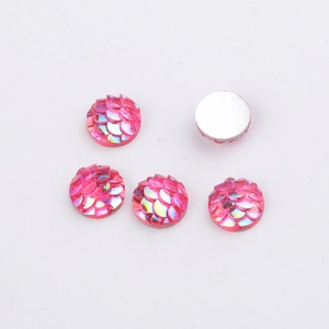 Detailed close-up of 8mm pink fish scale resin cabochons showing both front and back view