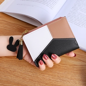 Short tri-color leather wallet for women with zipper closure and black tassel bunny charm