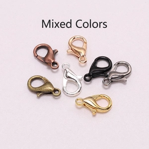 Detailed view of assorted alloy lobster clasps in mixed metallic finishes for jewelry DIY