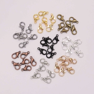 Macro view of alloy lobster clasps in assorted metallic colors for DIY jewelry making