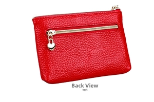 Close-up of red litchi grain leather back view with a golden heart-shaped zipper charm