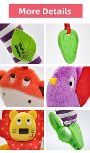 Detail of baby stroller toy featuring plush fox, bird, lion parts and green teether
