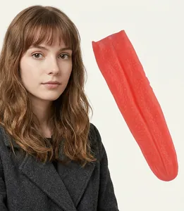 Close-up detail of realistic red fake long tongue prop with textured silicone surface