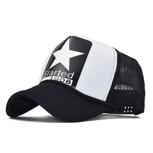 Detail of a black and white trucker hat featuring a 1908 star print and breathable mesh back