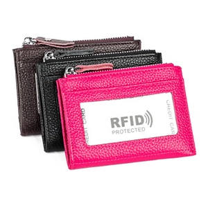 Detailed view of RFID protected genuine leather card holders in red, black, and burgundy