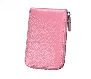 Pink pebbled leather zipper card holder with a close-up of the fine texture and puller