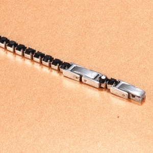 Adjustable silver stainless steel tennis bracelet with 3mm black cubic zirconia stones