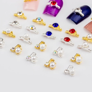 Bijoux d'ongles 3D en alliage avec perles et strass sur bases dorées et argentées