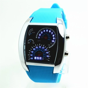 Detail view of the LED dashboard dial showing date and week functions on a blue sports watch