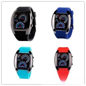 Detail view of sport LED watches with car dashboard display in black blue and red