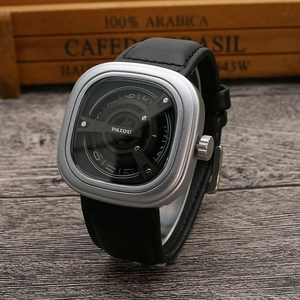 Detail shot of a square silver quartz watch with a unique black leather rotating dial