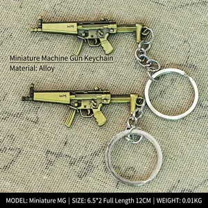 Miniature alloy MP5 submachine gun keychain souvenir with detailed metal craftsmanship