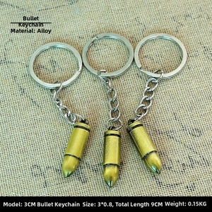 Three bronze alloy bullet-shaped keychains showing dimensions and metallic texture