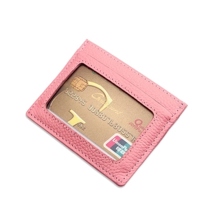 Pink litchi grain leather card holder with clear window slot and fine stitching