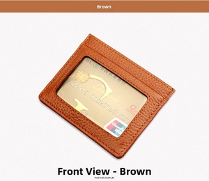 Detail view of brown pebbled leather RFID card holder with a clear ID window and fine stitching