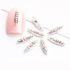 Marquise silver nail alloy charms with Aurora borealis rhinestones on white background