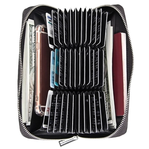 Interior detail of leather accordion wallet with multiple card slots and phone pocket