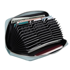 Detail of multi-slot leather accordion wallet showing high-capacity card and phone storage