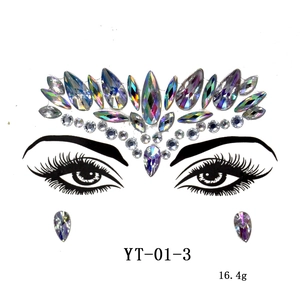 Detailed macro view of iridescent AB acrylic face gems on a white display card