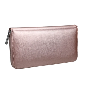 Detail of rose gold leather accordion wallet with lychee texture and silver zipper